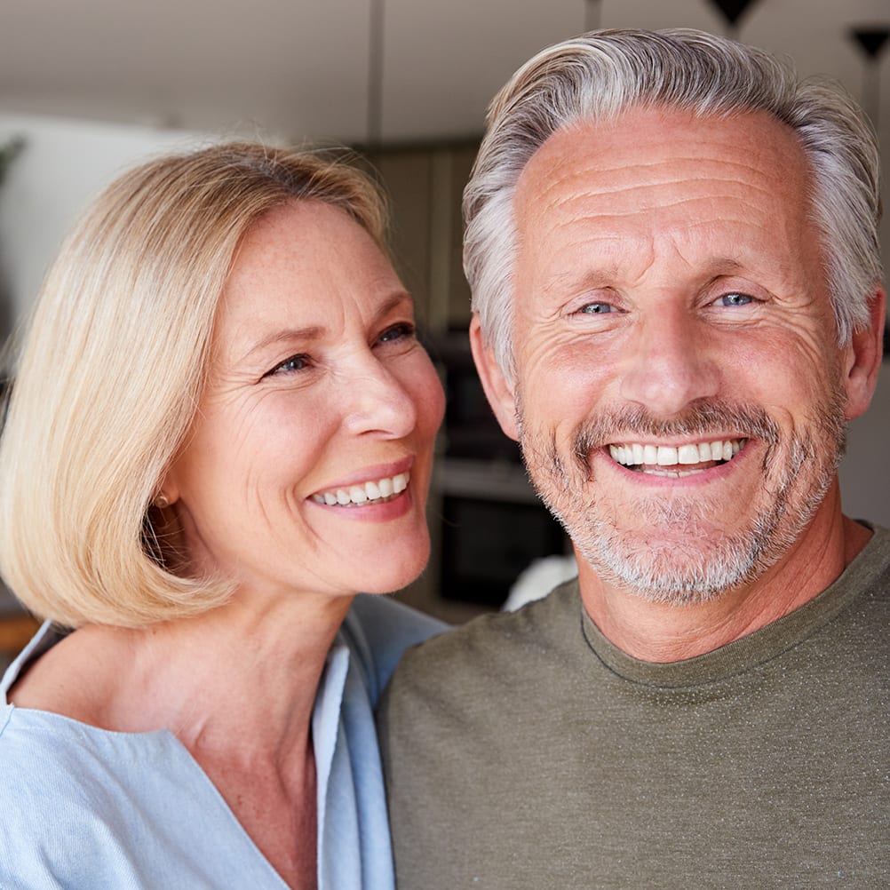 Middle-aged woman looking at husband