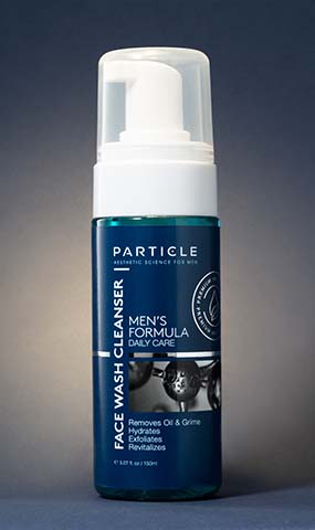 Bottle of Particle Men's Formula Face Wash Cleanser with a pump dispenser