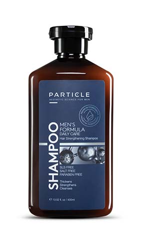 A brown bottle of Particle Men's Formula Shampoo for daily care.